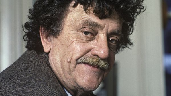 A quote from Kurt Vonnegut tells a story about buying one envelope at a time and says human beings are dancing animals.